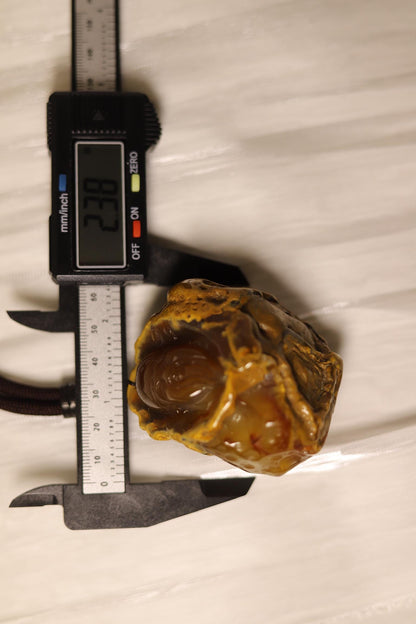 Hand-Carved Agate Pendant: Rustic Brown Sculpture, Polished Interior